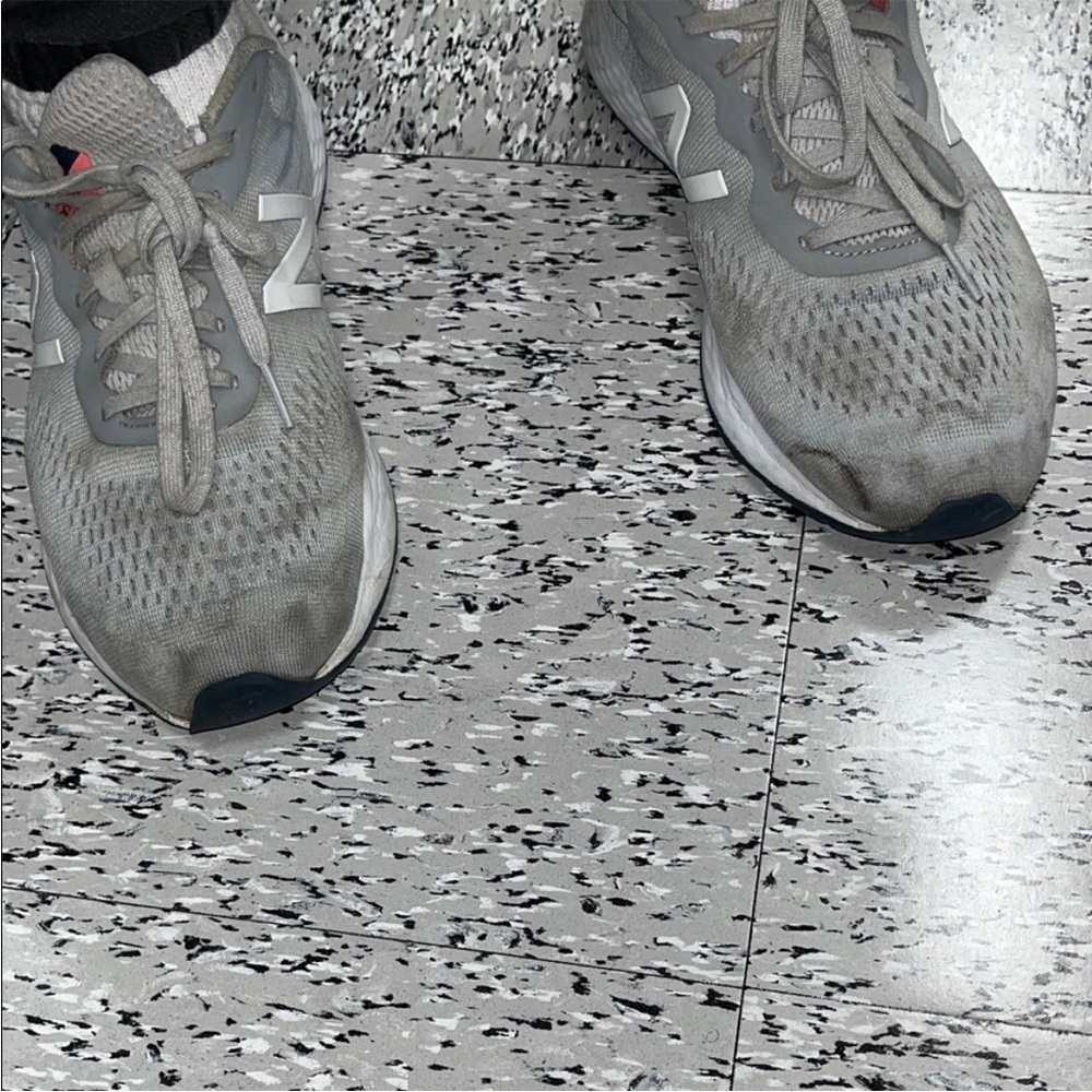 Well Worn  Dingy New Balance Light Gray Running Shoes